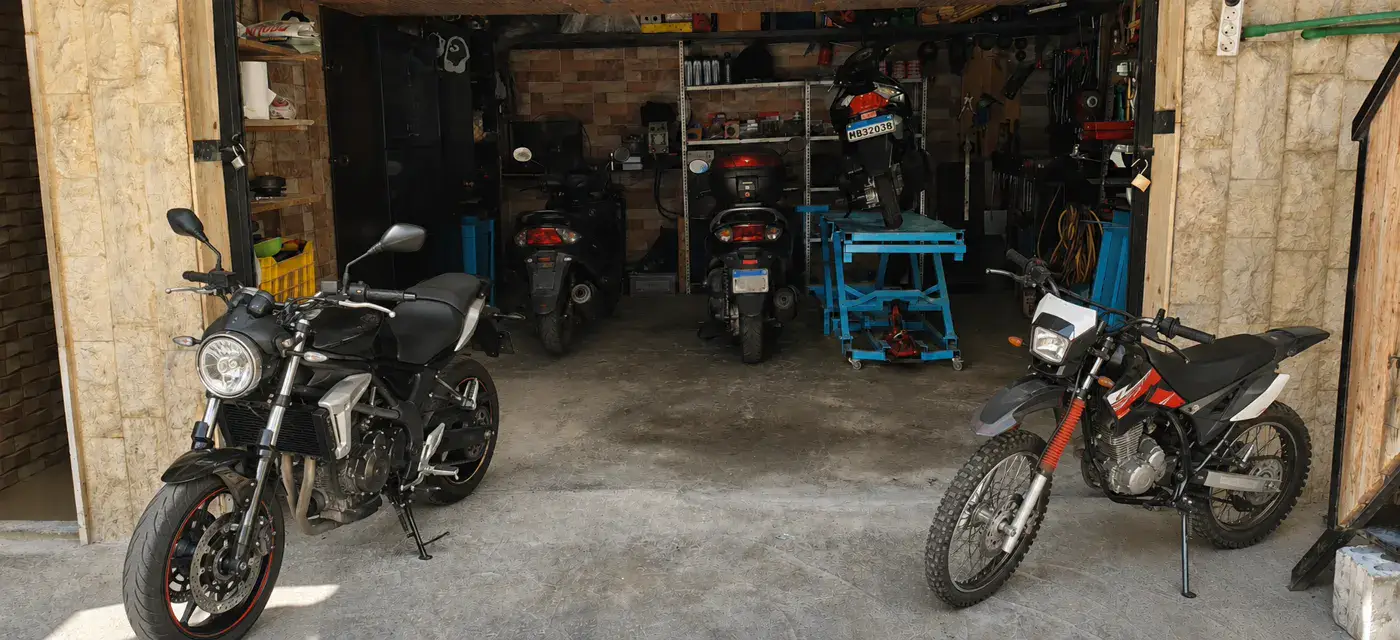 Mbarak Motorcycle Garage front